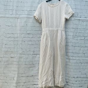 Button-back Ivory Floral Jumpsuit with pockets